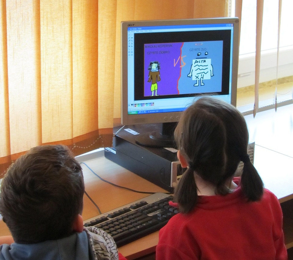 Mentor guiding a student through a science project