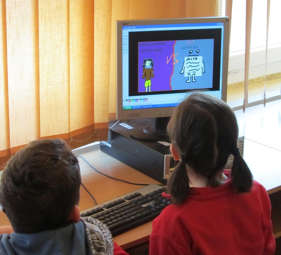 Mentor guiding a student through a science project